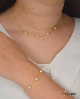 Srebrny naszyjnik pozłacany z naturalnymi perłami JMAS7029GN45. Srebrny pozłacany naszyjnik z perłą naturalną to niezwykle wyjątkowy i nietuzinkowy dodatek, który doskonale sprawdzi się w stylizacjach (1).JPG