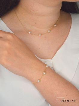 Srebrny naszyjnik pozłacany z naturalnymi perłami JMAS7029GN45. Srebrny pozłacany naszyjnik z perłą naturalną to niezwykle wyjątkowy i nietuzinkowy dodatek, który doskonale sprawdzi się w stylizacjach (2).JPG
