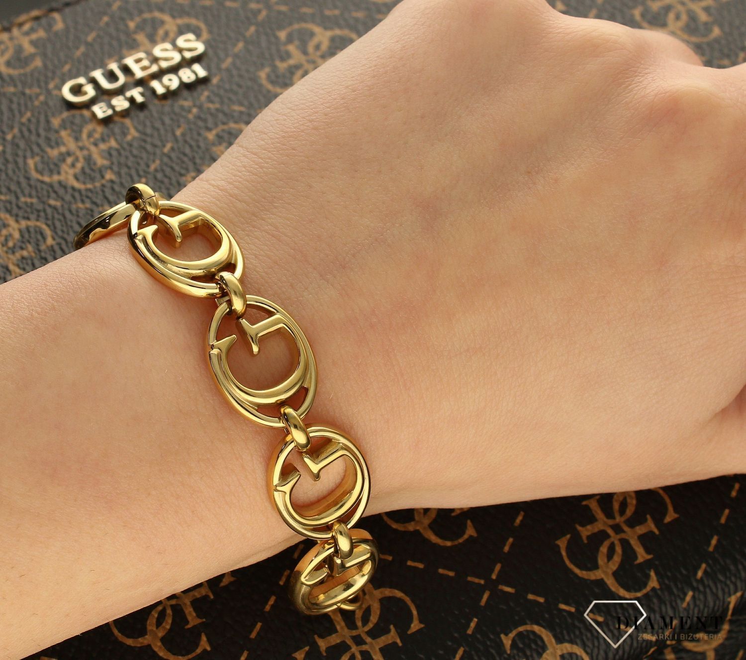 Bransoletka GUESS stalowa pozłacana UBB01044JWYGS.jpg