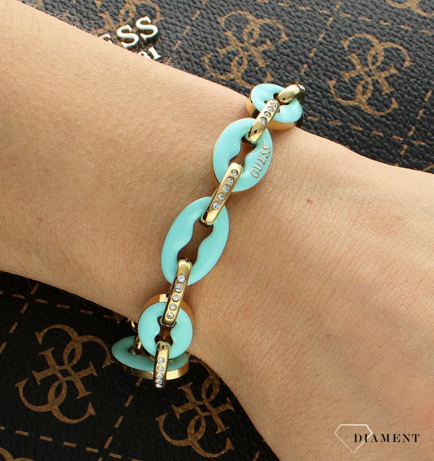 Bransoletka damska GUESS z turkusowymi ogniwkami JUBB01413JWYGAQS.jpg