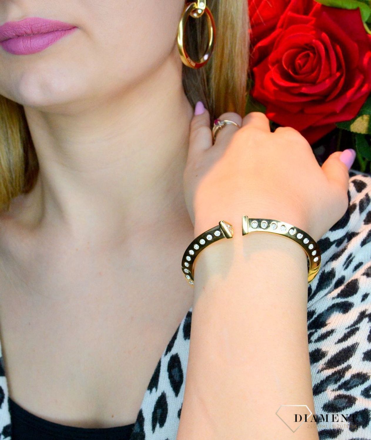 Złota bransoletka damska Guess sztywna z cyrkoniami JUBB01481JWYGL.webp