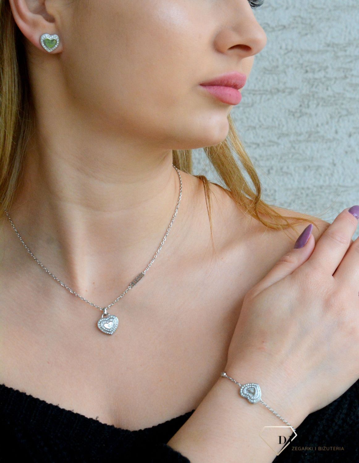 Bransoletka GUESS srebrna z sercem z kryształkami JUBB04031JWRHS.Ponadczasowa, stalowa bransoletka GUESS z elementem ozdobnym w formie serduszka z kryształkami z logiem Guess (2).jpg