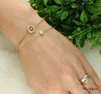 Bransoletka damska Guess podwójny łańcuszek JUBB04160JWYGL. Stalowa bransoletka Guess. Bransoletrka damska w złotym kolorze Guess. Modna bransoletka damska Guess z logo. Bransoletka damska Guess na prezent.3.jpg
