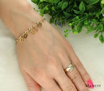 Bransoletka damska Guess Arm Party z logo JUBB04224JWYGS. Stalowa bransoletka Guess. Bransoletrka damska w złotym kolorze Guess. Modna bransoletka damska Guess z logo. Bransoletka damska Guess na prezent.3.jpg