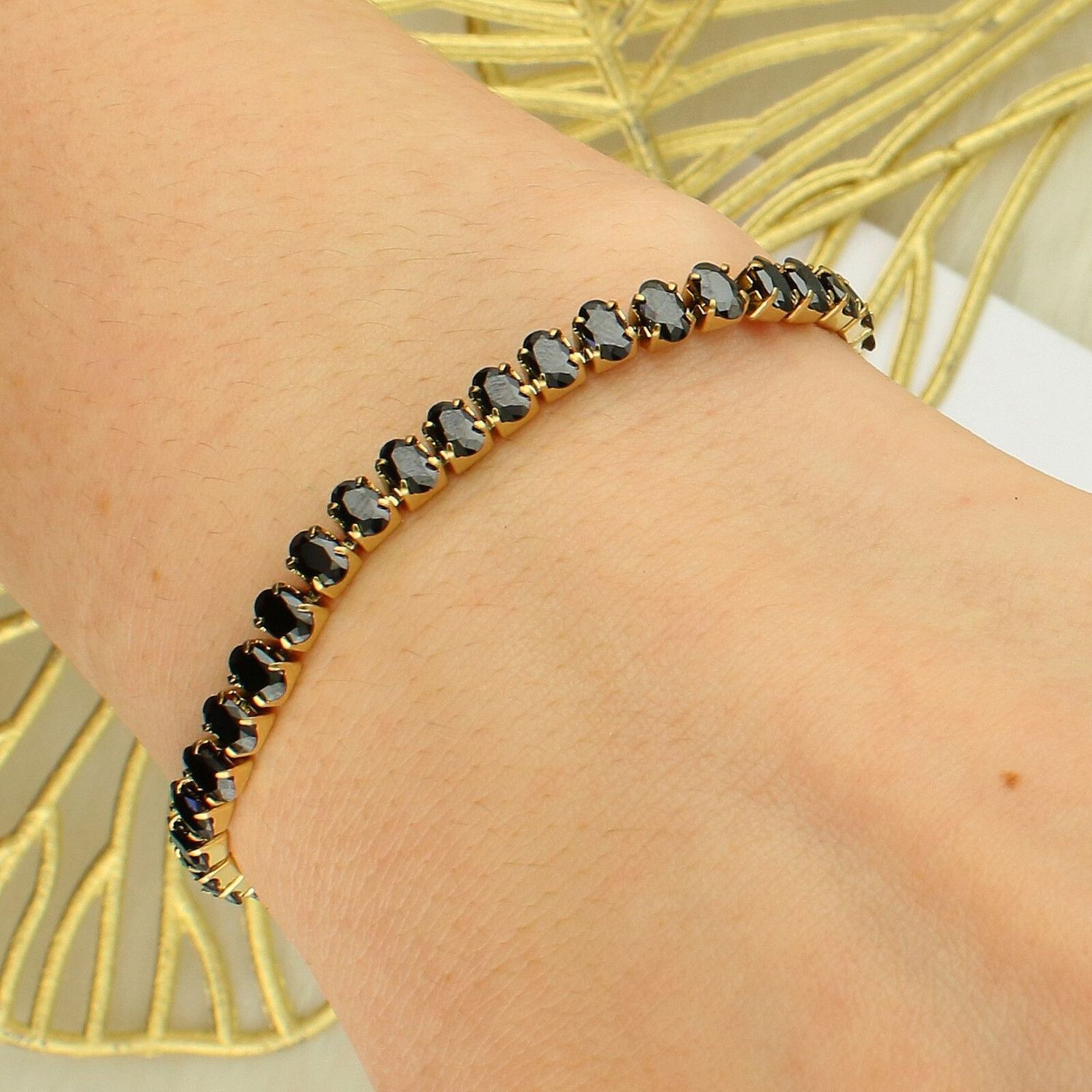 Guess JUBB05141JWYGBKTU Złota Bransoletka z Czarnymi Cyrkoniami – Stal 316L black.jpg