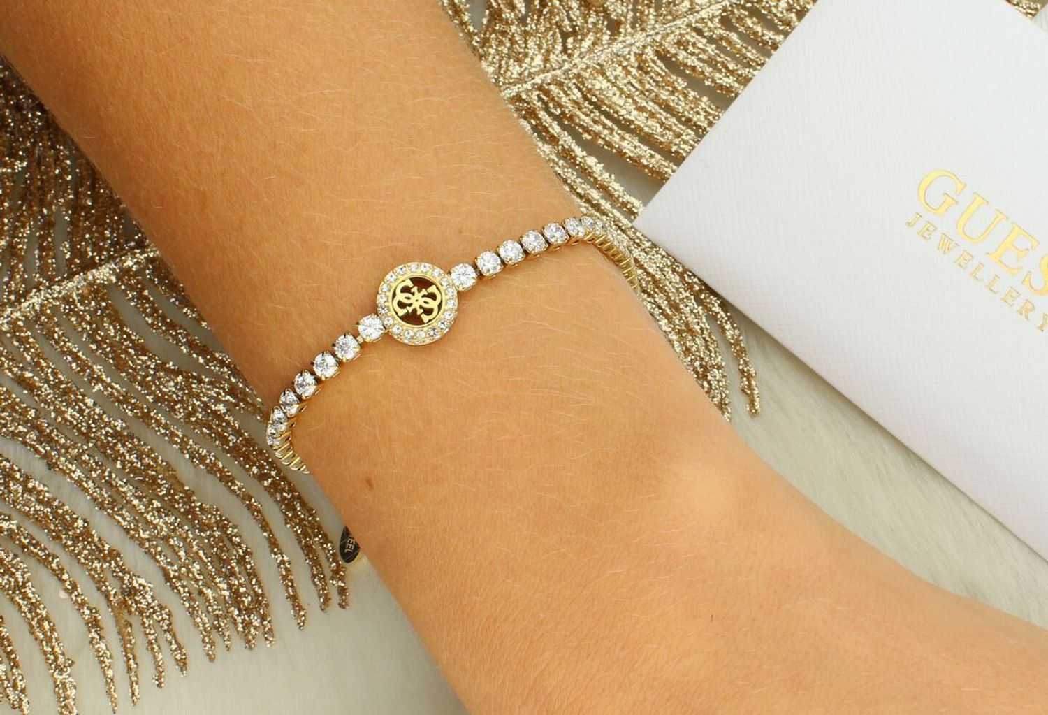 Damska bransoletka Guess Paradise JUBB05142JWYGS – stal szlachetna z kryształamissss.jpg