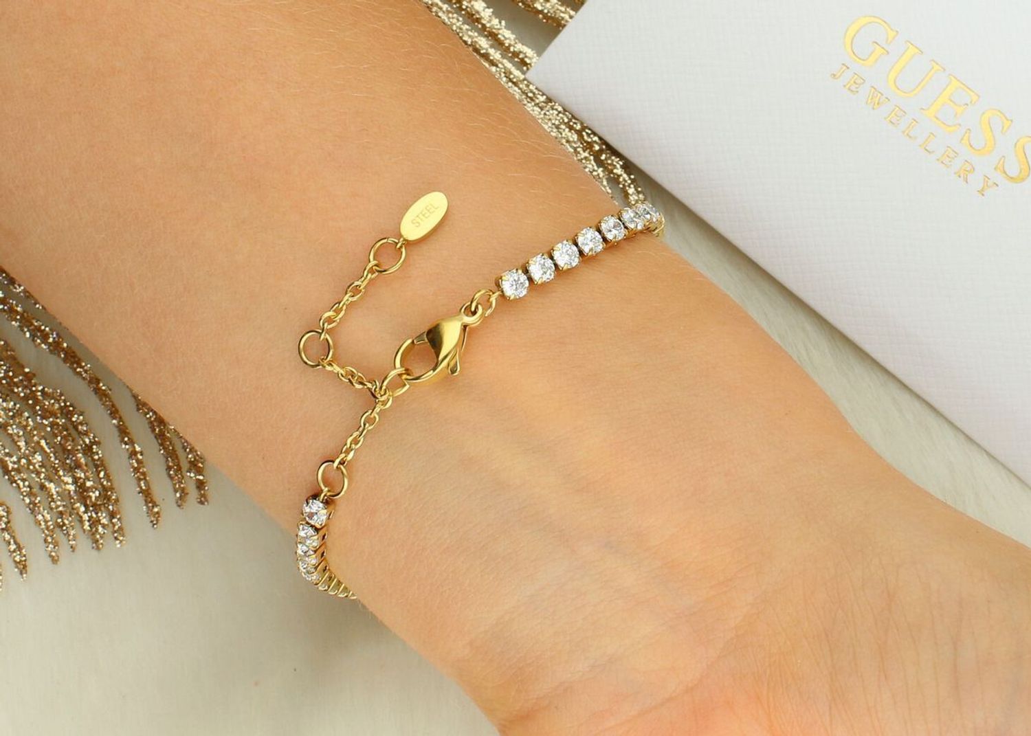 Damska bransoletka Guess Paradise JUBB05142JWYGS – stal szlachetna z kryształamissss.jpg