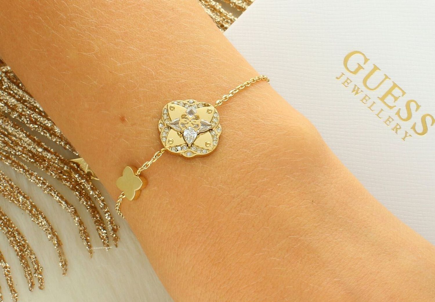 Damska bransoletka Guess Wild Flower JUBB05503JWYGS – stal szlachetna z cyrkonią.jpg