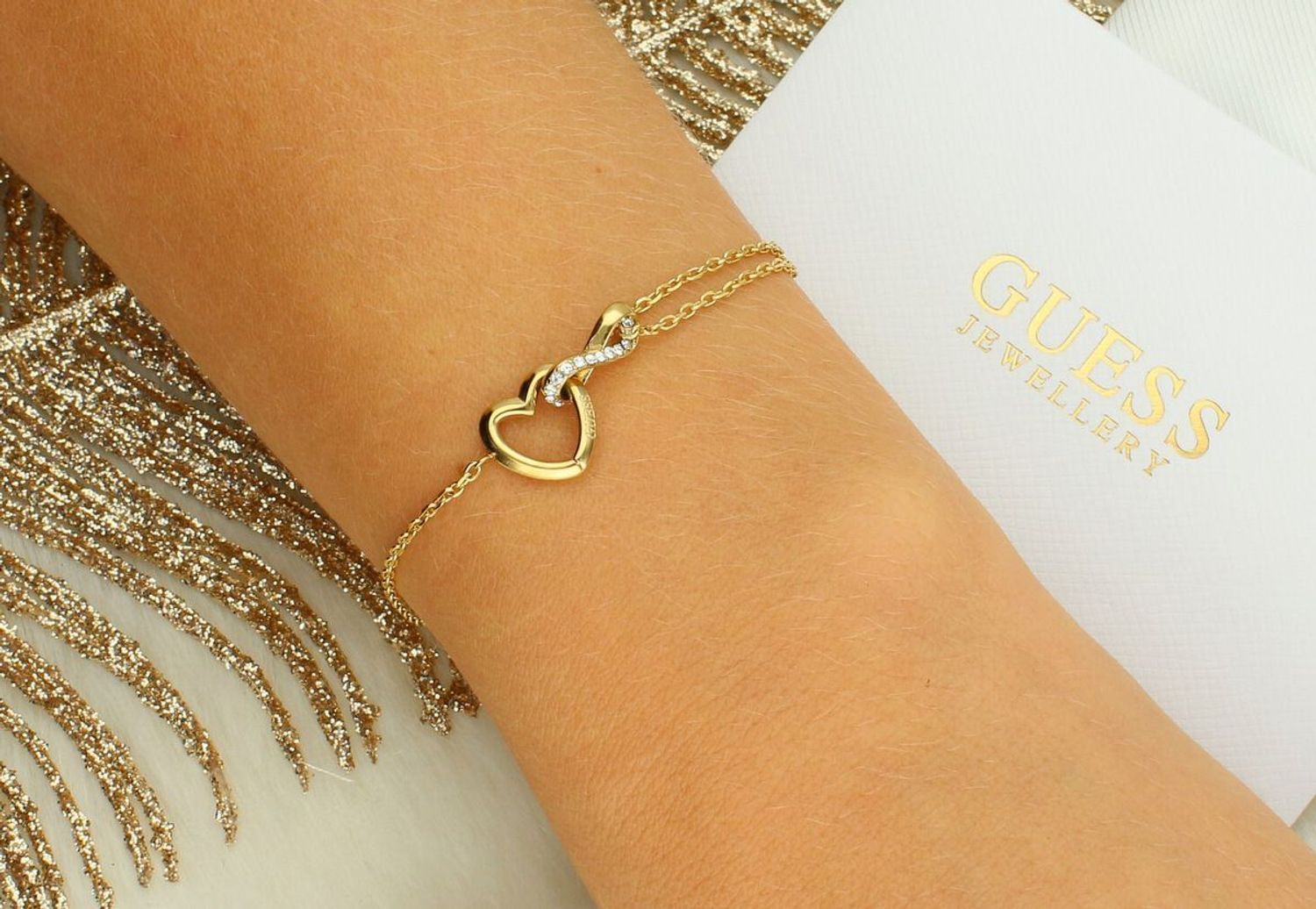 Damska Bransoletka Guess Iconique JUBB05531JWYGS – Serce i Nieskończoność z Cyrkonią.jpg