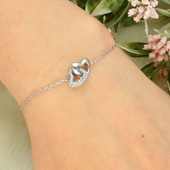 Bransoletka damska Guess JUBB06014JWRHS srebrna serca z cyrkoniami fashion.jpg