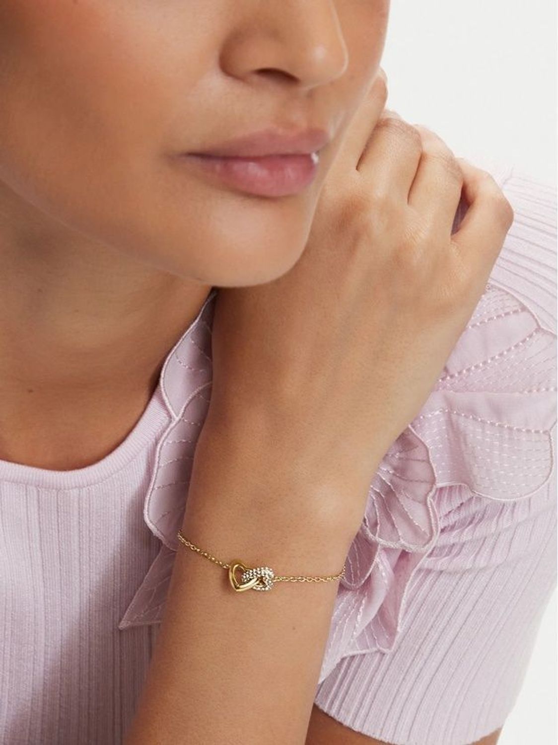 Bransoletka damska Guess JUBB06014JWYGS złota s4erca z cyrkoniami.jpg