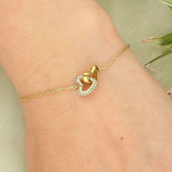 Bransoletka damska Guess JUBB06014JWYGS złota serca z cyrkoniami heart.jpg