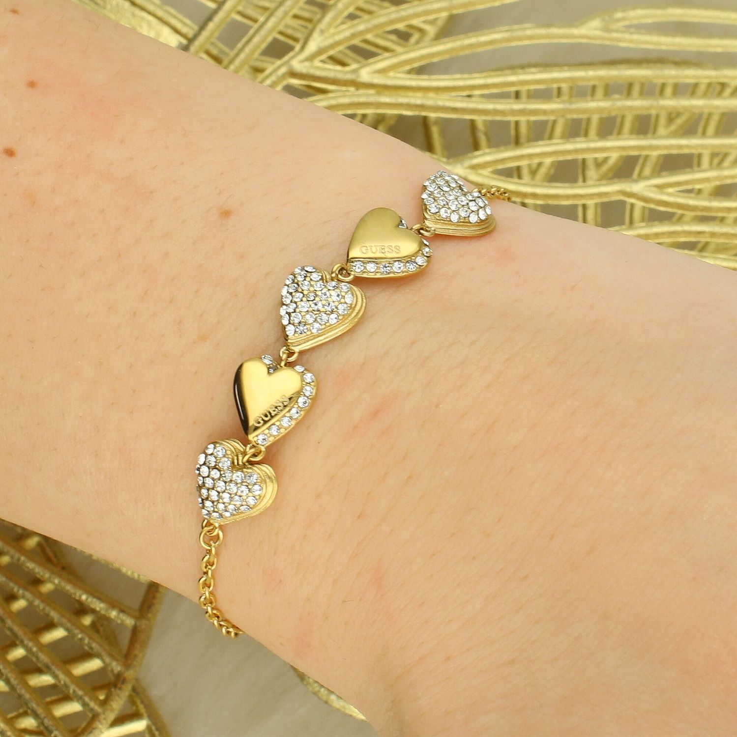 Damska Bransoletka GUESS JUBB06071JWYGS z 5 Sercami i Cyrkoniami – stal szlachetna.jpg