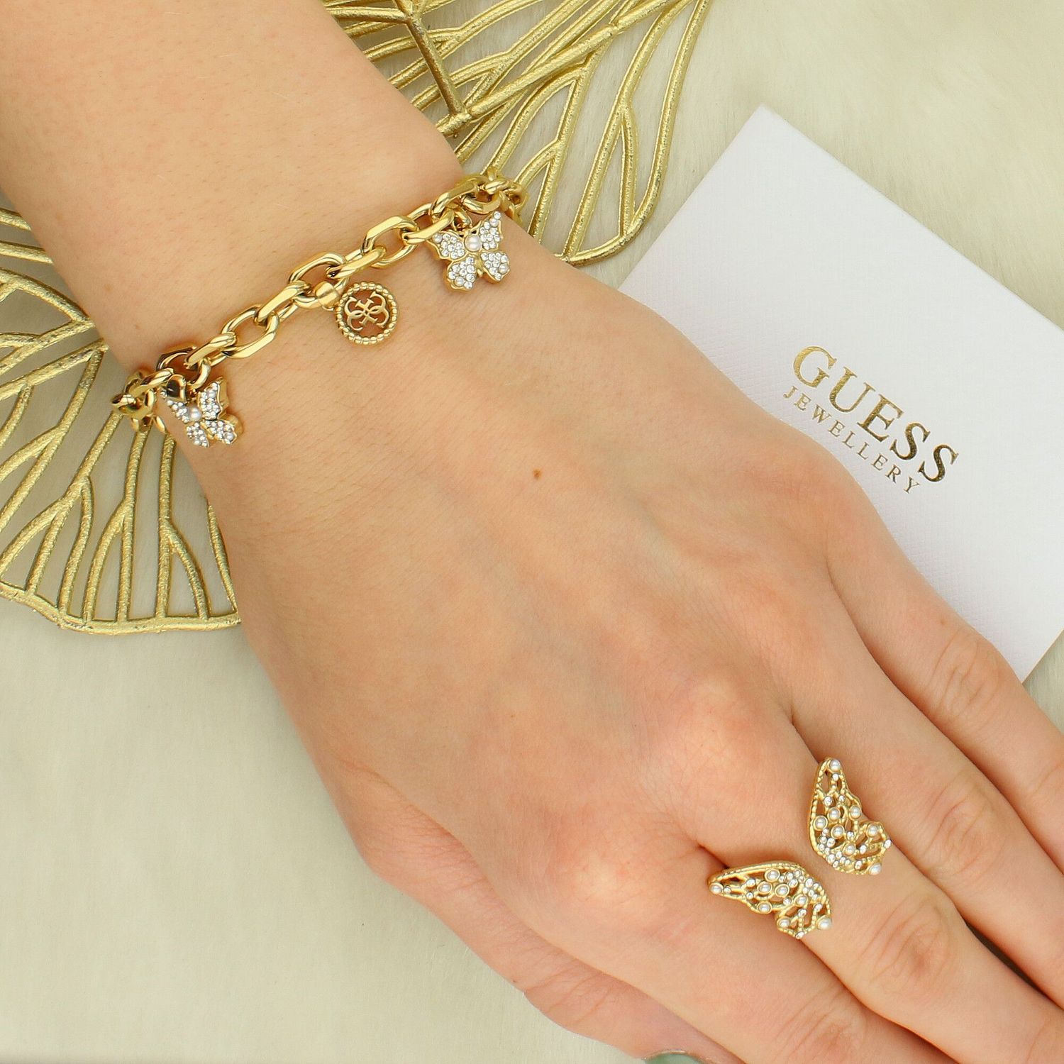 Bransoletka Guess JUBB06130JWYGS z Motylkami i Cyrkoniami – Stal Nierdzewna 20 cm.jpg