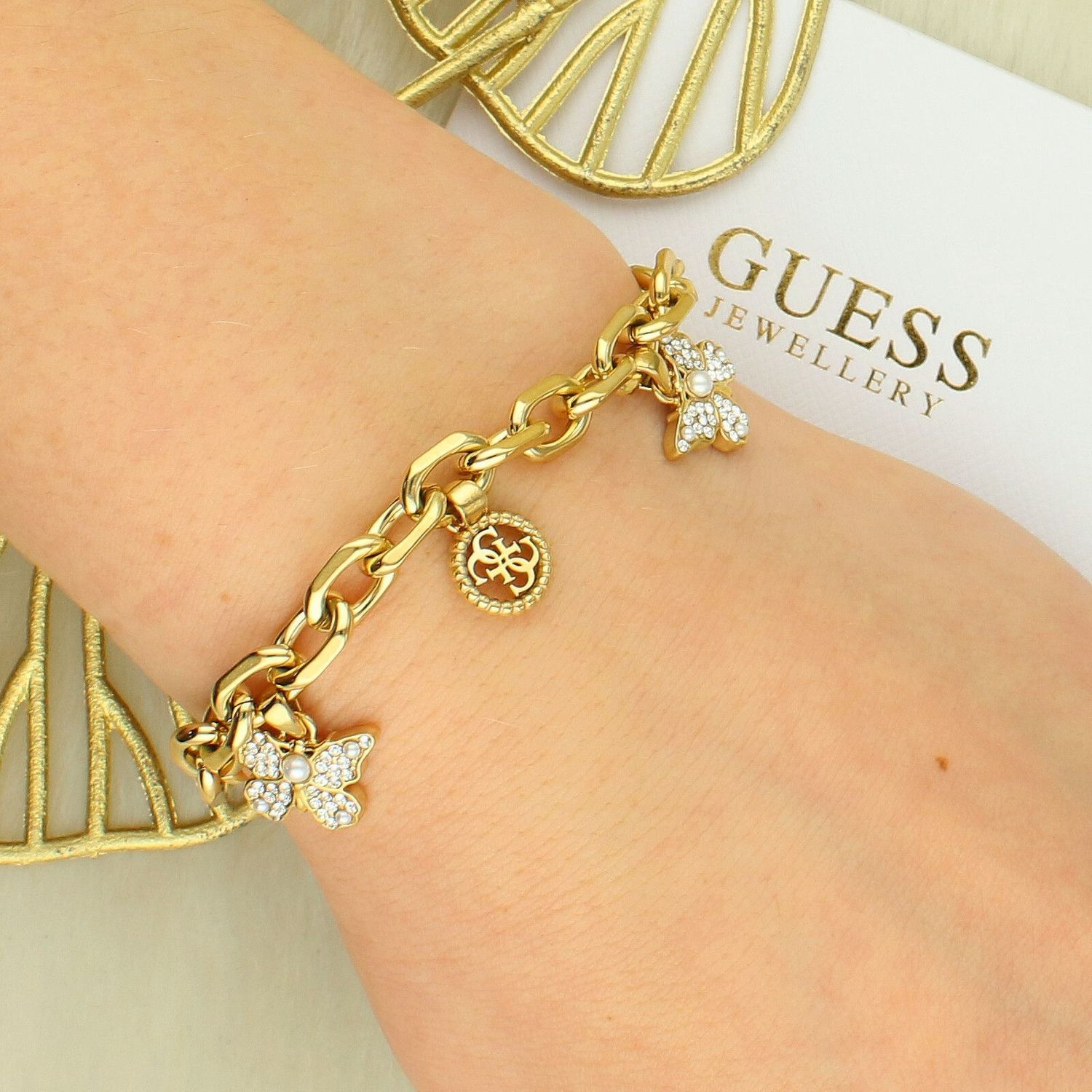 Bransoletka Guess JUBB06130JWYGS z Motylkami i Cyrkoniami – Stal Nierdzewna 20 cm.jpg