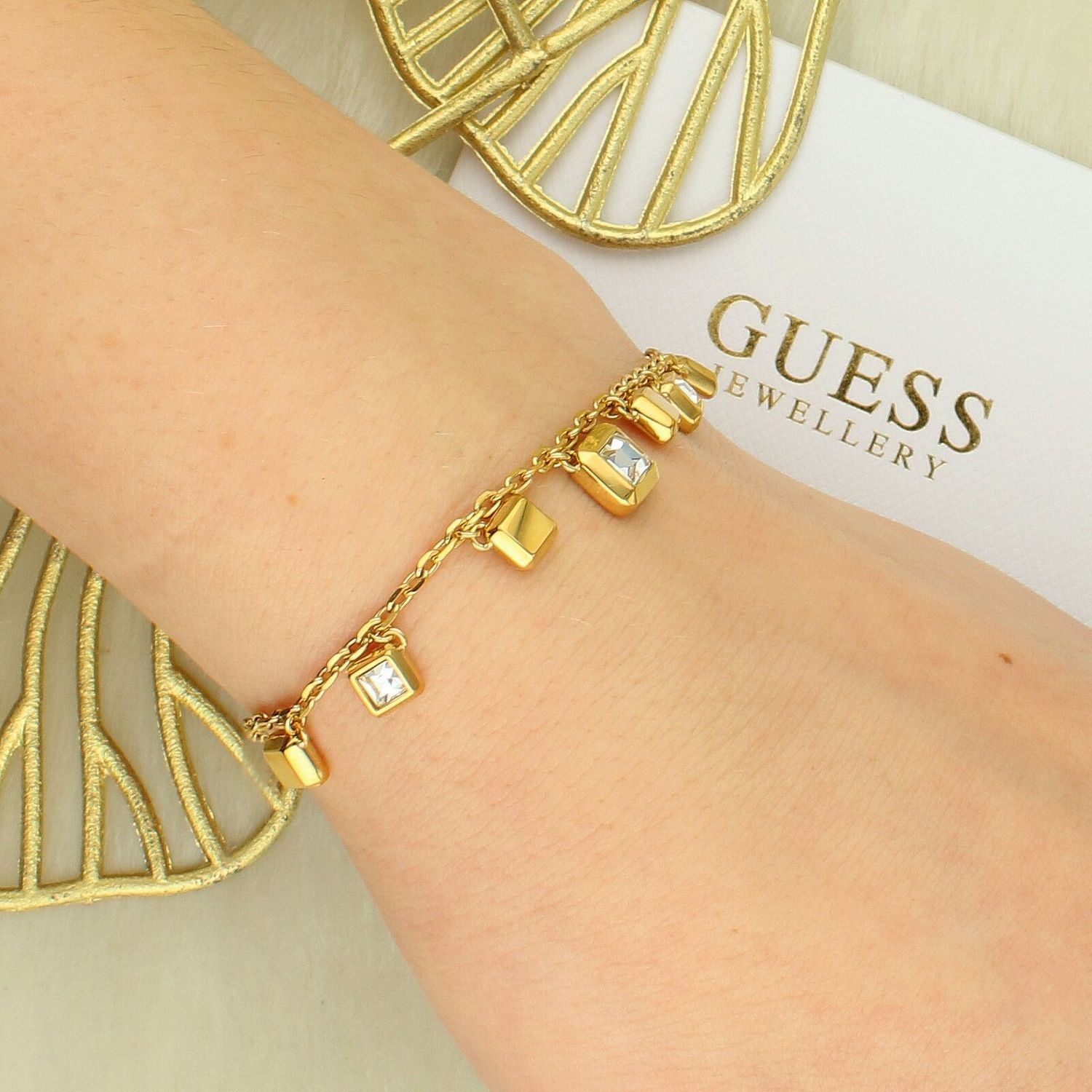 Bransoletka damska Guess JUBB06179JWYGS kostkami i cyrkoniami – stal antyalergiczna.jpg