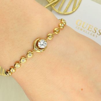 Bransoletka Guess JUBB06235JWYGS ze stali nierdzewnej w kolorze żółtym z cyrkoniami – regulowana 15-19 cm stal.jpg