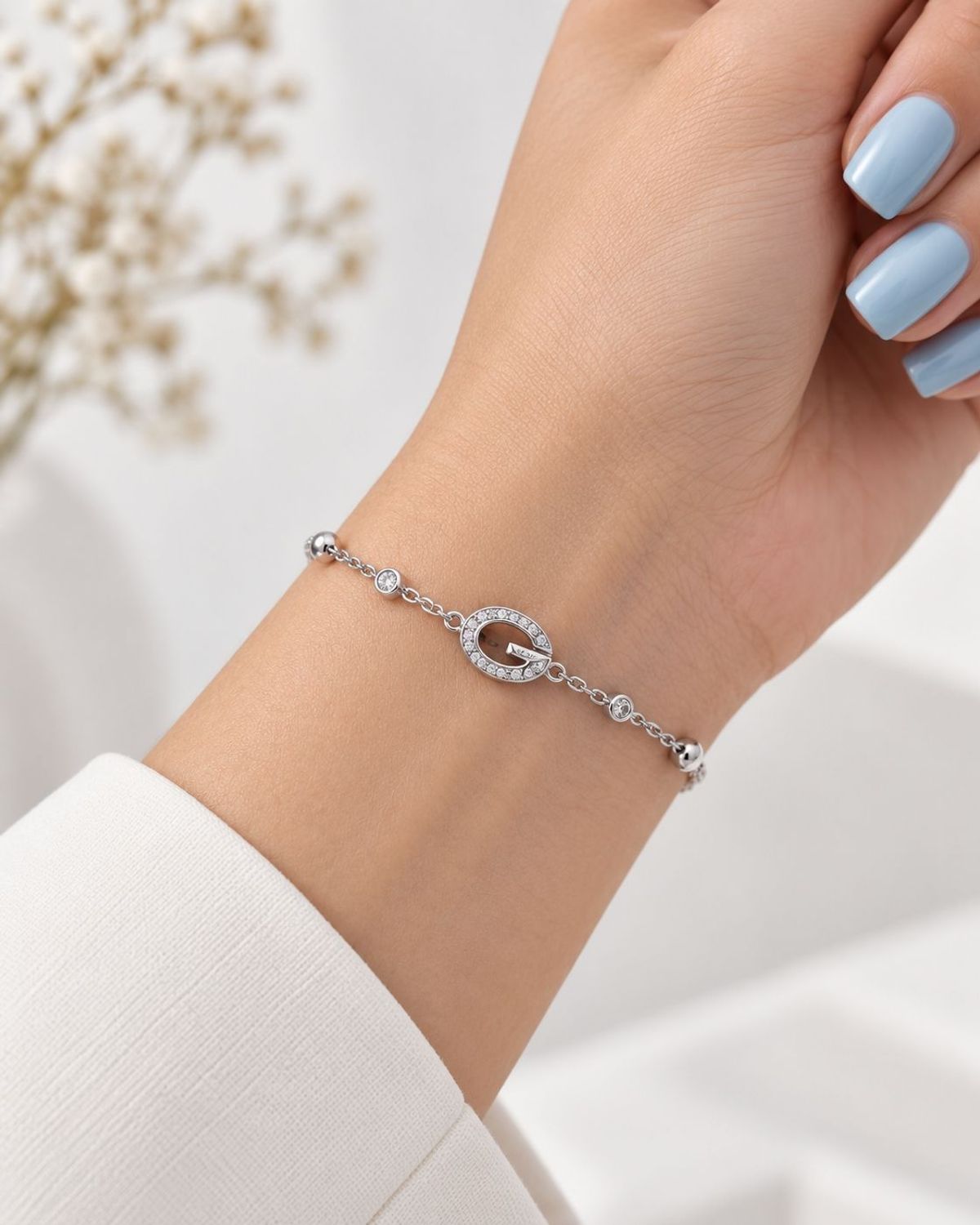 Bransoletka damska GUESS JUBB06337JWRHS srebrna z logo G i cyrkoniami (1).jpg