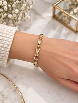 Bransoletka damska Guess JUBB06341JWYGL złota stalowa z kryształkami (1).jpg