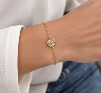 Bransoletka damska Guess 4G Supreme JUBB06397JWYGS – złota z kryształami (1).jpg