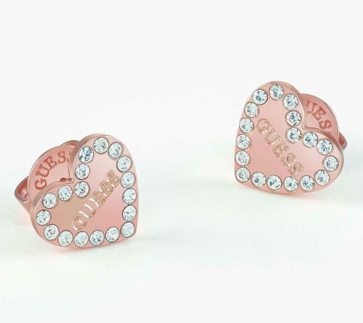 Kolczyki GUESS stalowe serca różowe złoto ozdobione napisem Guess i cyrkonią UBE01082JWRGTU.jpg