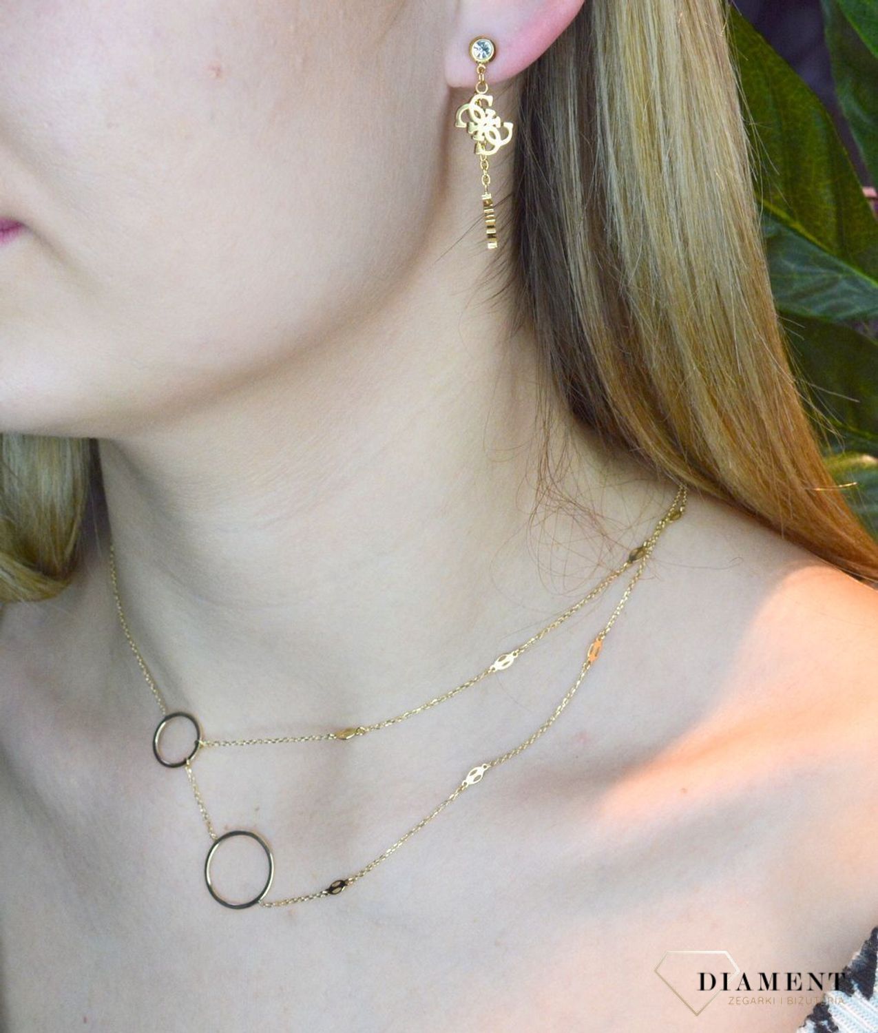 12Kolczyki złote damskie GUESS 'Wiszące logo' JUBE01177JWYGT.jpg