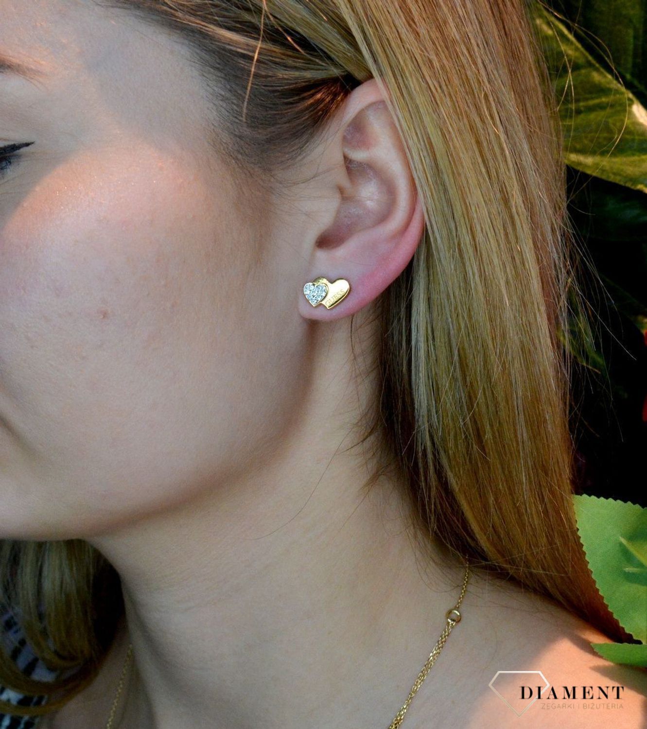 Złote kolczyki damskie GUESS stalowe 'Podwójne serca' JUBE02174JWYGT.jpg