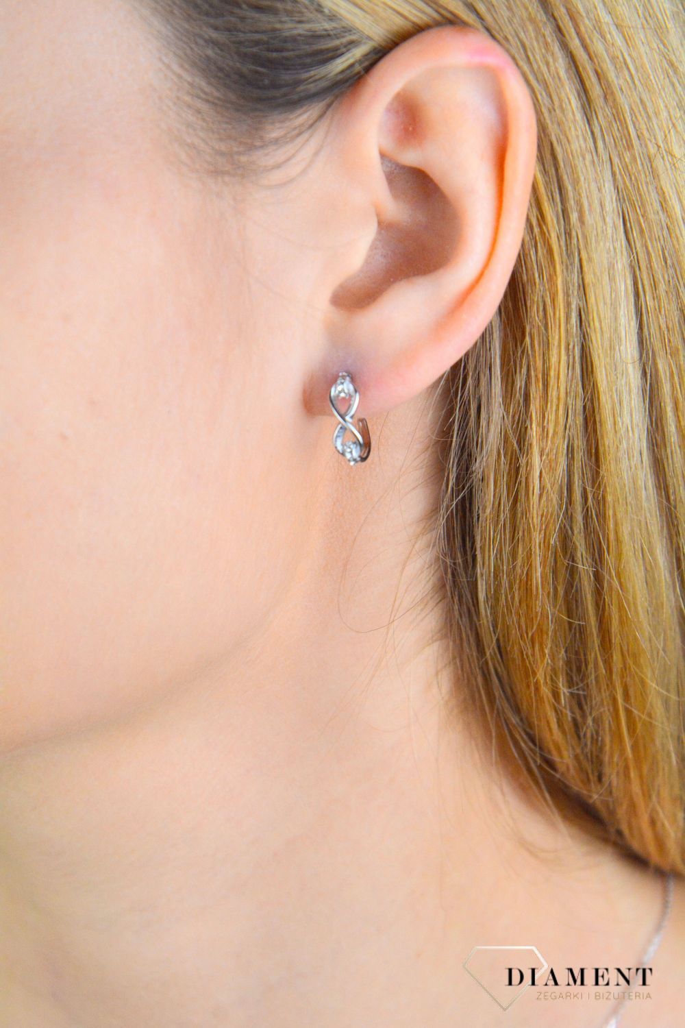 Kolczyki damskie GUESS stalowe wkrętki nieskończoność JUBE03272JWRHTU.jpg