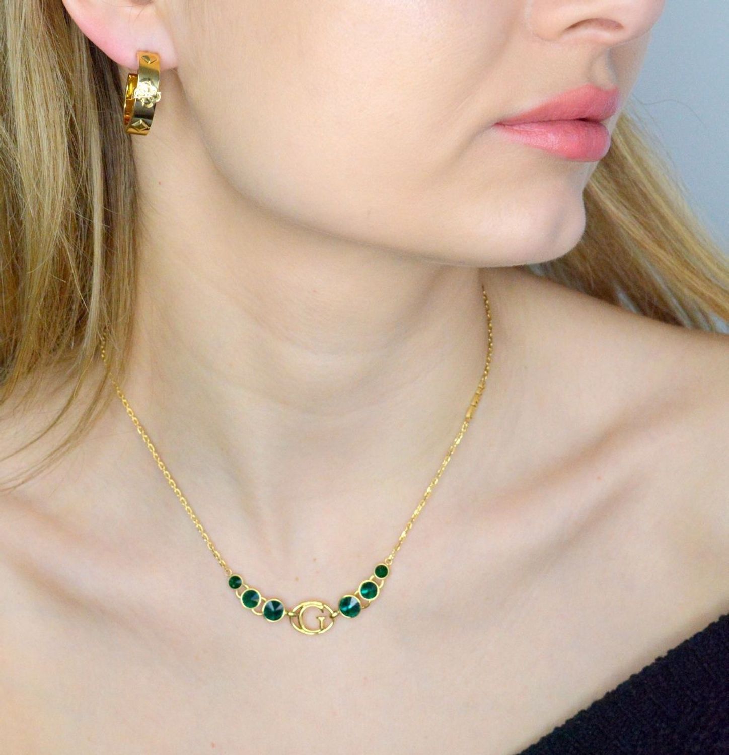 Kolczyki GUESS stalowe pozłacane owalne logo Guess JUBE03290JWYGT-U.jpg