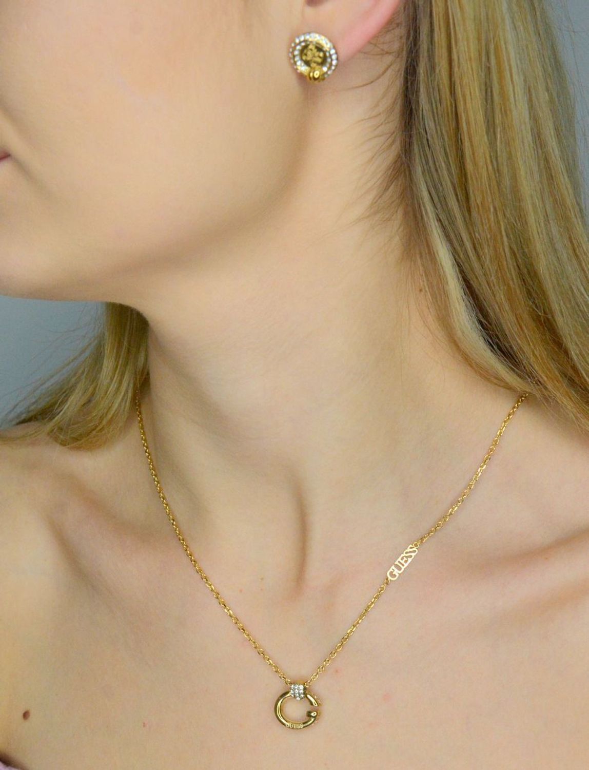 Kolczyki Guess pozłacane Knot you wkrętki JUBE04058JWYGT-U.webp