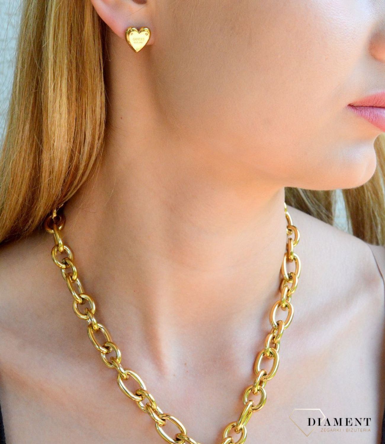 Złote kolczyki wkrętki serca Guess JUBE04209JWYGT-U.jpg