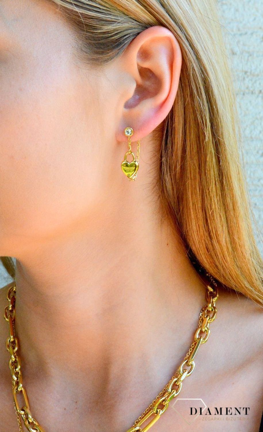 Złote kolczyki wiszące Guess z cyrkoniami i sercem JUBE04212JWYGT-U.jpg