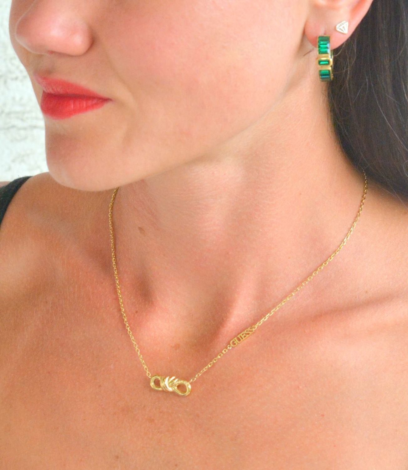 Naszyjnik GUESS pozłacany z zawieszką znak nieskończoności JUBN04010JWYGT-U.png