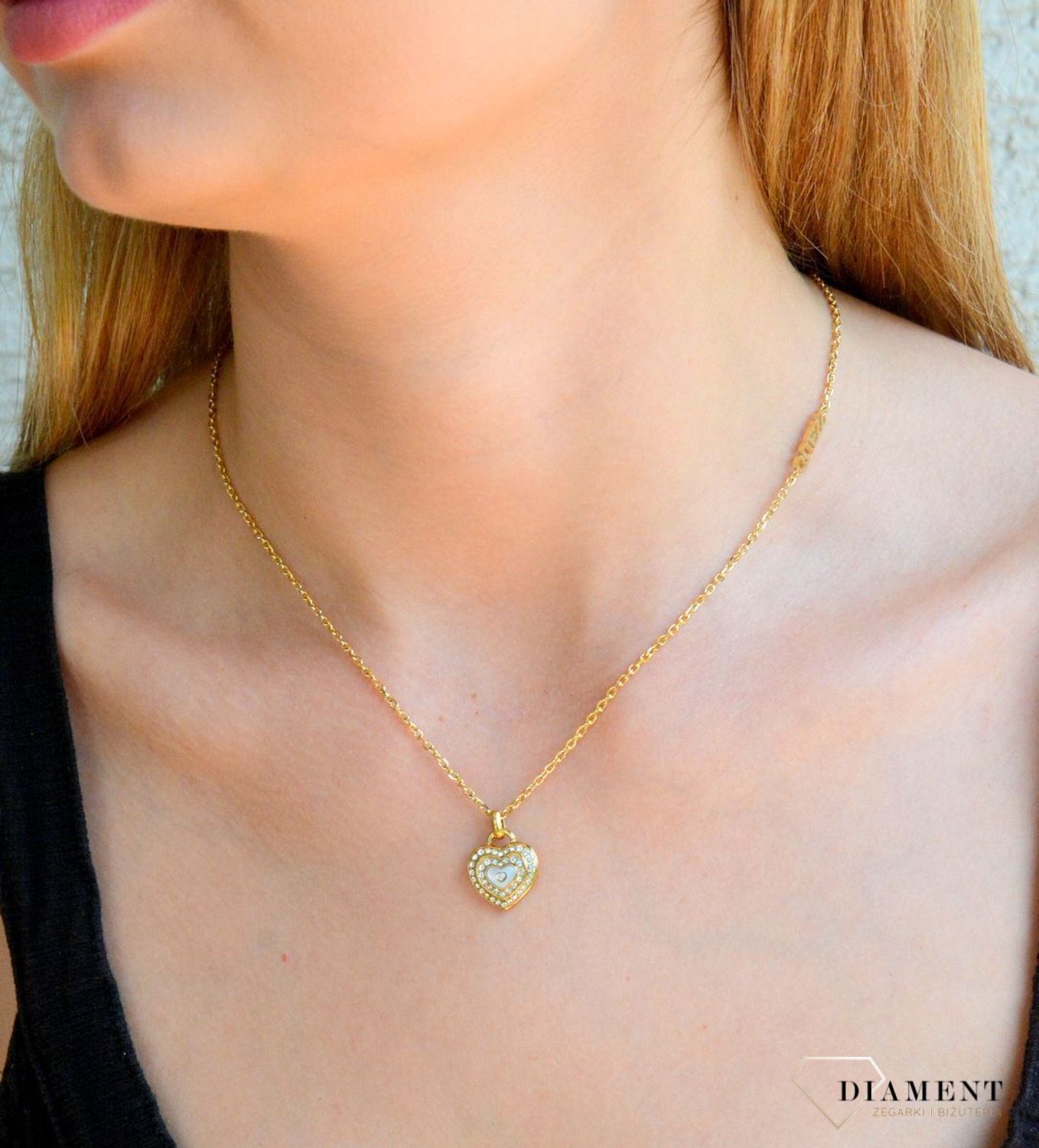 Naszyjnik damski Guess Amami z masą perłową JUBN04026JWYGWHT-U. Oryginalny naszyjnik marki Guess. Biżuteria Guess na prezent dla kobiety. Naszyjnik z sercem Guess..jpg