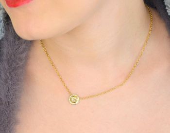 Odkryj naszyjnik GUESS JUBN05446JWYGTU – pozłacany model z zawieszką w kształcie kółka ozdobioną cyrkoniami. Wykonany ze stali szlachetnej 316L, nie zawiera niklu. Subtelna elegancja na każdą okazję (2).JPG