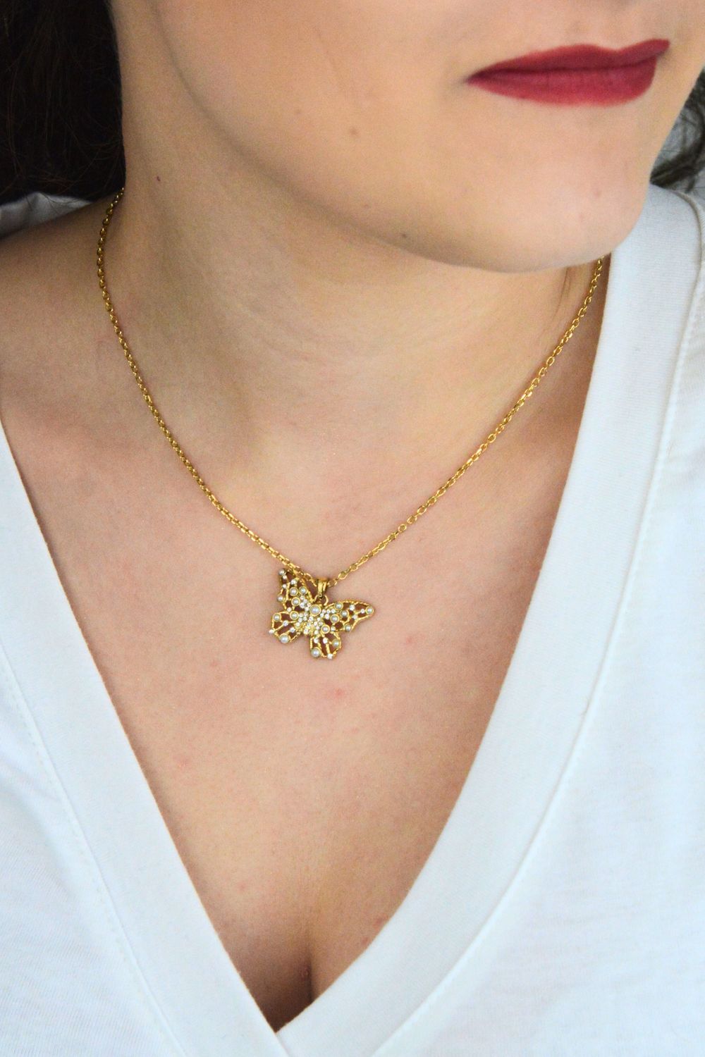 Naszyjnik Guess Stalowy Złoty z Motylkiem, Cyrkoniami i Perełkami JUBN06119JWYGT-U.jpg