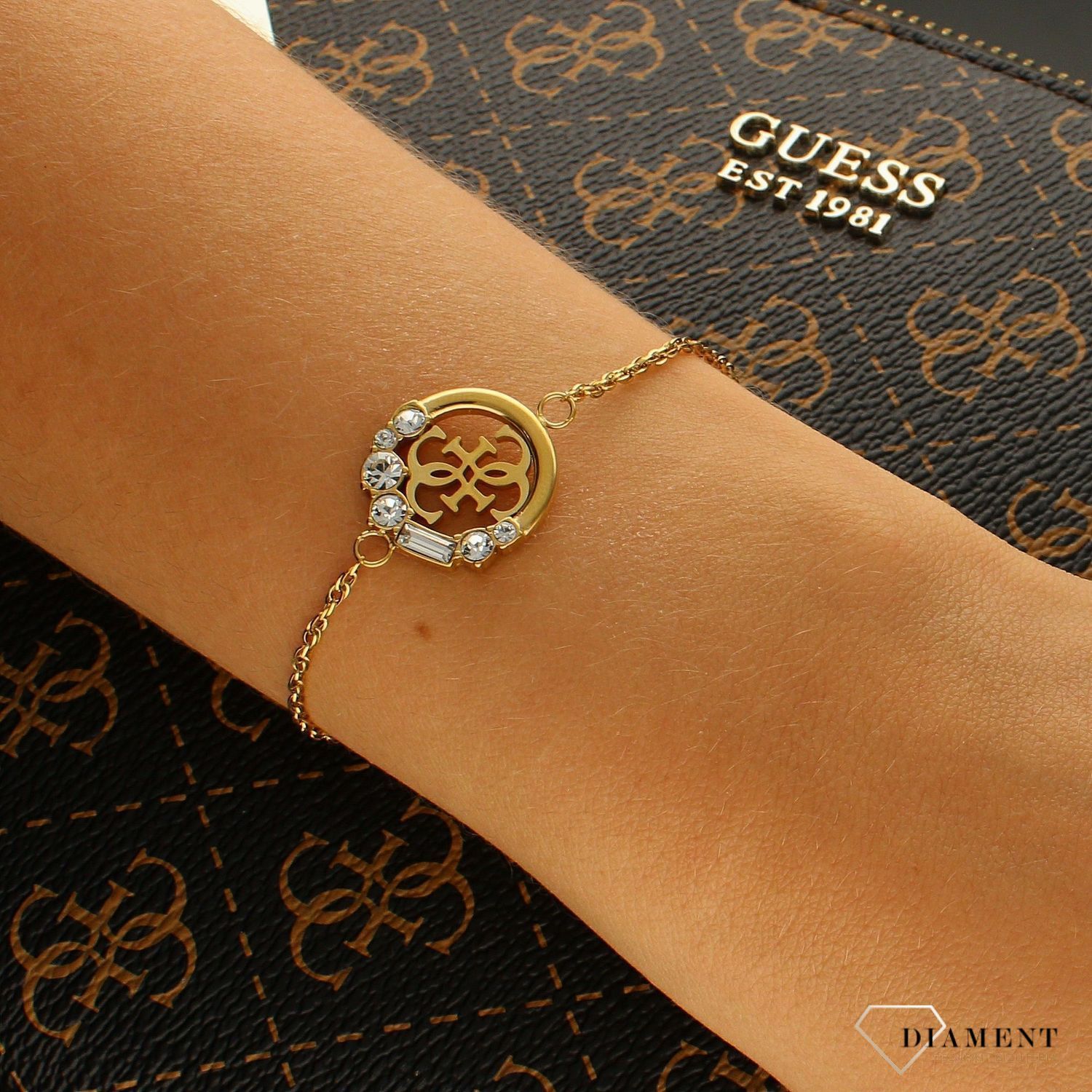 Komplet stalowy GUESS w kolorze złotym z cyrkoniami JUBS01016JWYGS✓ Biżuteria GUESS ✓Komplet Guess wykonany z najwyższej jakości stali w kolorz (1).jpg