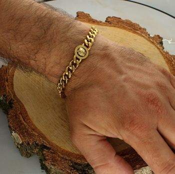 Męska bransoletka Guess pancerka z motywem lwa – złota stal, 20 cm.jpg