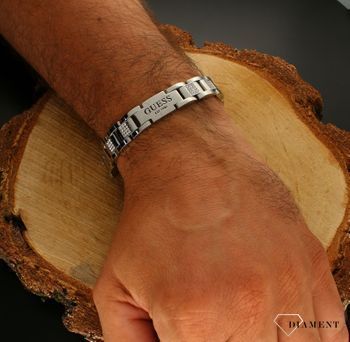 Srebrna męska  bransoletka GUESS z białymi kamieniami JUMB01342JWSTT-U. Srebrna męska biżuteria ze stali chirurgicznej z kamieniami. Idealny pomysł na prezent dla mężczyzny w każdym wieku..jpg