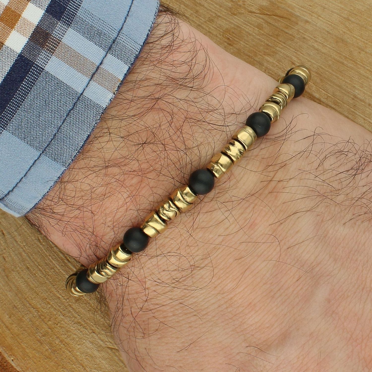 Bransoletka Guess JUMB06021JWYGBKL złota czarne koraliki 23 cm  męska (2).jpg