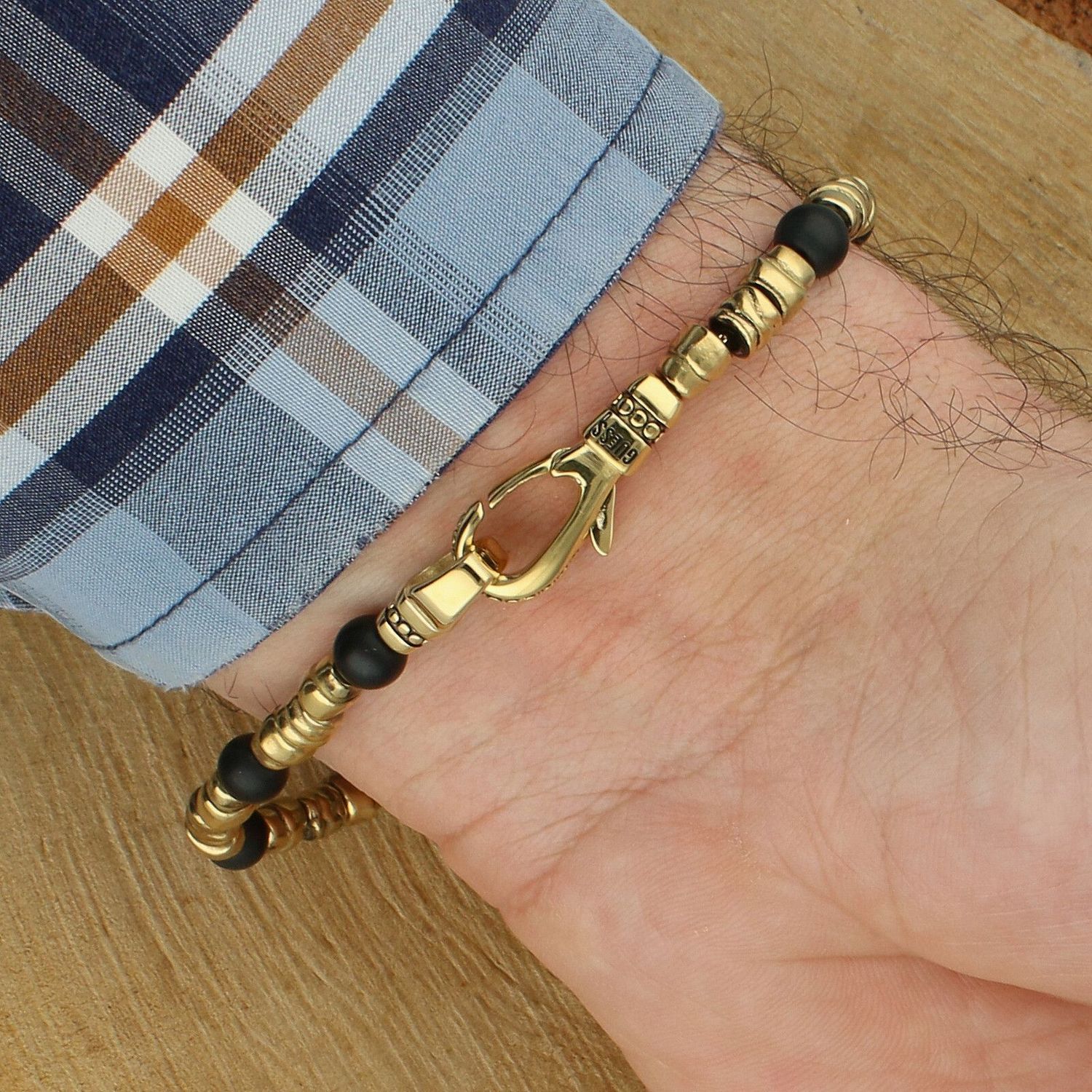 Bransoletka Guess JUMB06021JWYGBKL złota czarne koraliki 23 cm  męska (2).jpg