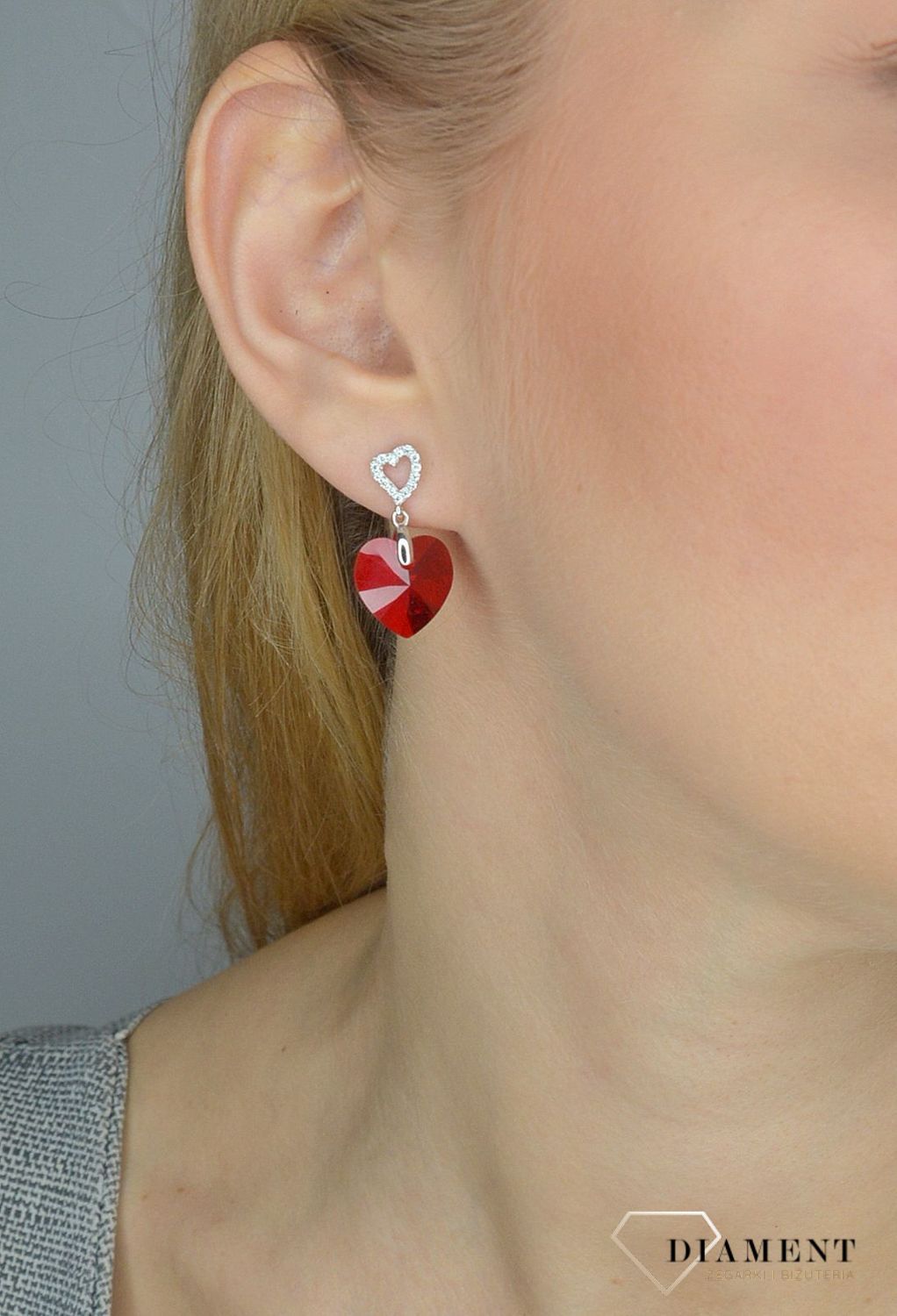 Piękne wiszące kolczyki Spark Swarovski to ciekawa biżuteria z efektownym połączeniem srebra i luksusowych czerwonych kryształków Swarovskiego..jpg