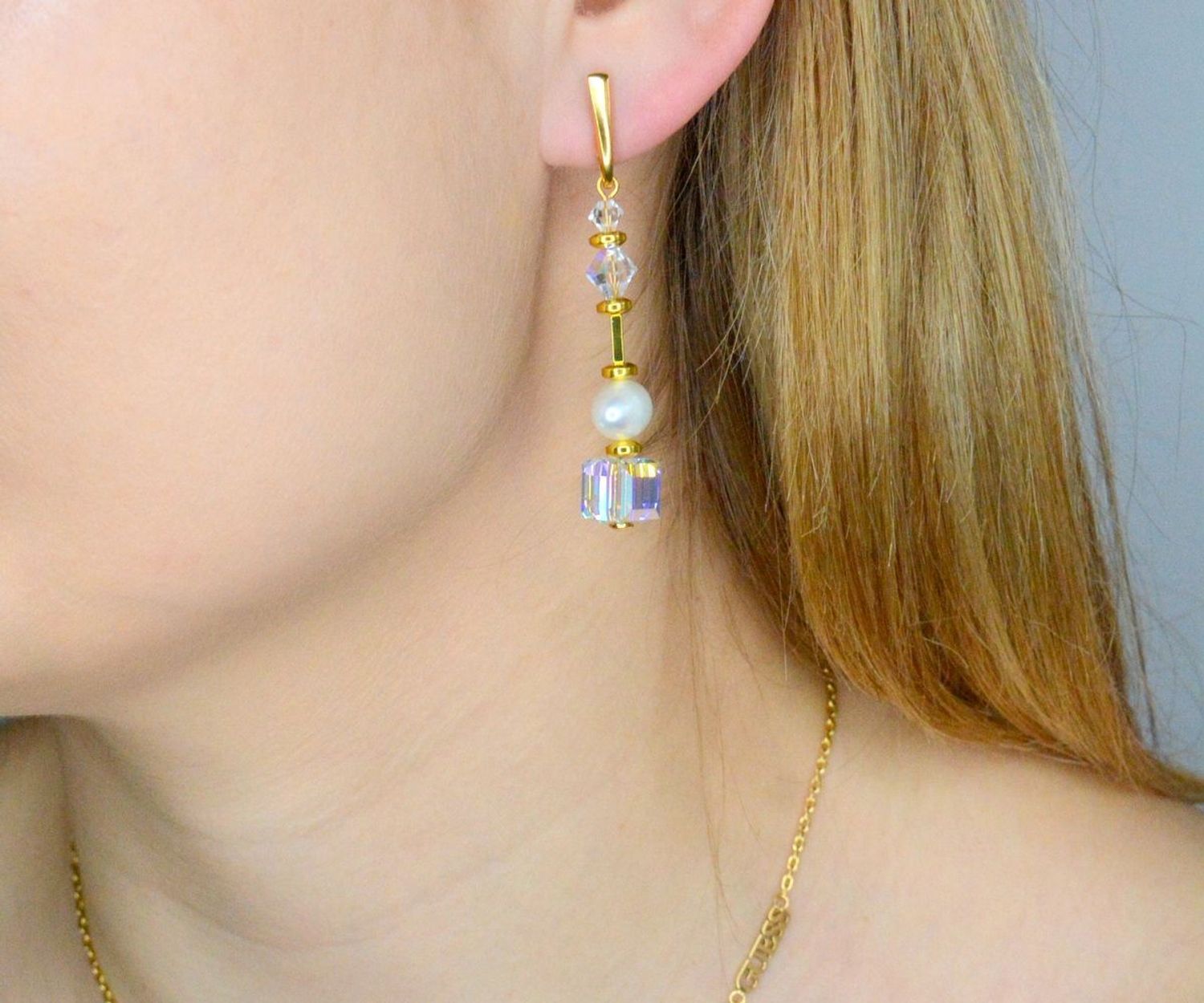 Srebrne kolczyki pozłacane Aurora Borealis z kryształami Swarovskiego, perłą i hematytem KG56015810ABW. Srebrne kolczyki wiszące Spark. Kolczyki pozłacane z perłą i hematytem. Kolczyki srebrne pozłacane z kryształem Swarovskiego. Kolczyki.jpeg