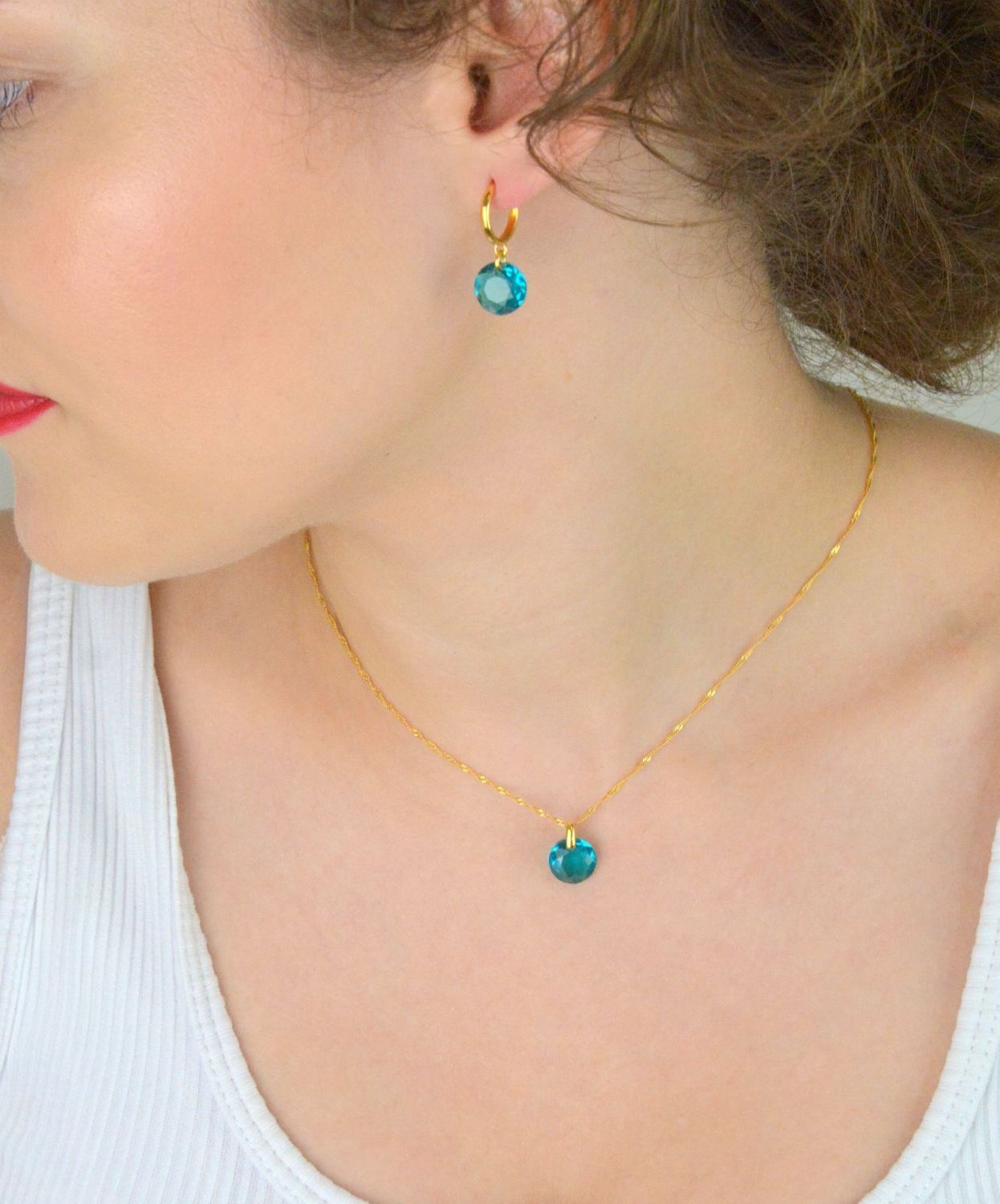 Kolczyki Spark KG643010BZ z pozłacanego srebra 925 i austriackich kryształów. Elegancja, blask i wygoda. Zapakowane w eleganckie pudełko.1.jpg