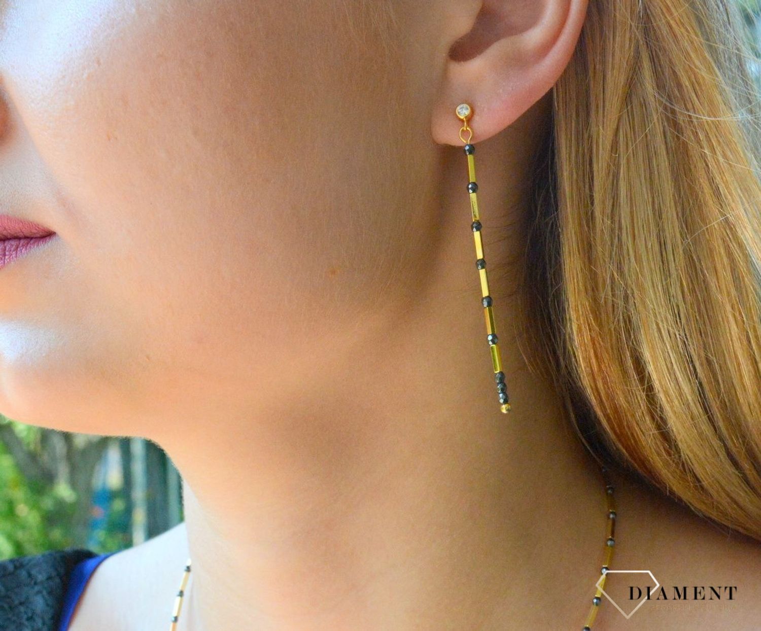 Kolczyki srebrne Spark pokryte złotem Marigold Long w kolorze Silver KHEG1B. Kolczyki wiszące Spark z kamieniami naturalnymi. Kolczyki w złoto-czarnym kolorze. Koczyki pozłacane Spark. Idealne kolczyki na prezent..jpg
