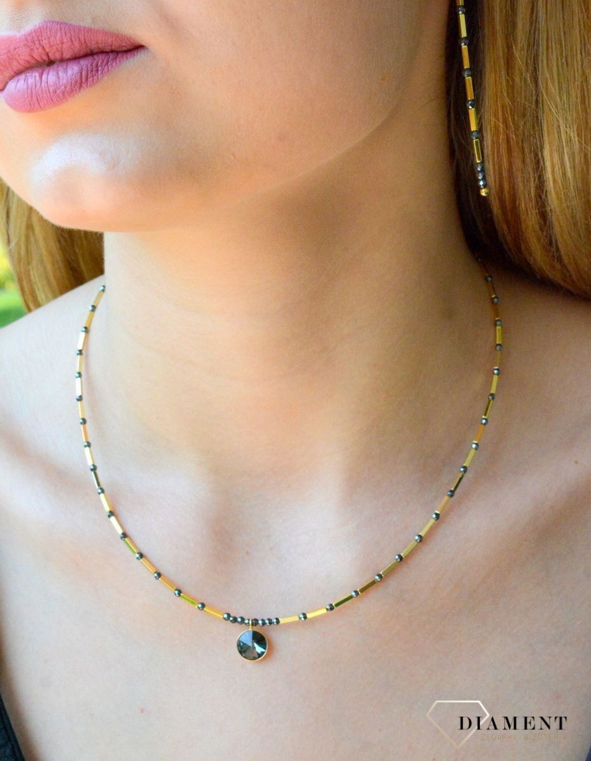 Kolczyki srebrne Spark pokryte złotem Marigold Long w kolorze Silver KHEG1B. Kolczyki wiszące Spark z kamieniami naturalnymi. Kolczyki w złoto-czarnym kolorze. Koczyki pozłacane Spark. Idealne kolczyki na prezent..jpg