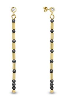 Kolczyki srebrne Spark pokryte złotem Marigold Long w kolorze Silver KHEG1B. Kolczyki wiszące Spark z kamieniami naturalnymi. Kolczyki w złoto-czarnym kolorze. Koczyki pozłacane Spark. Idealne kolczyki na prezent..jpg