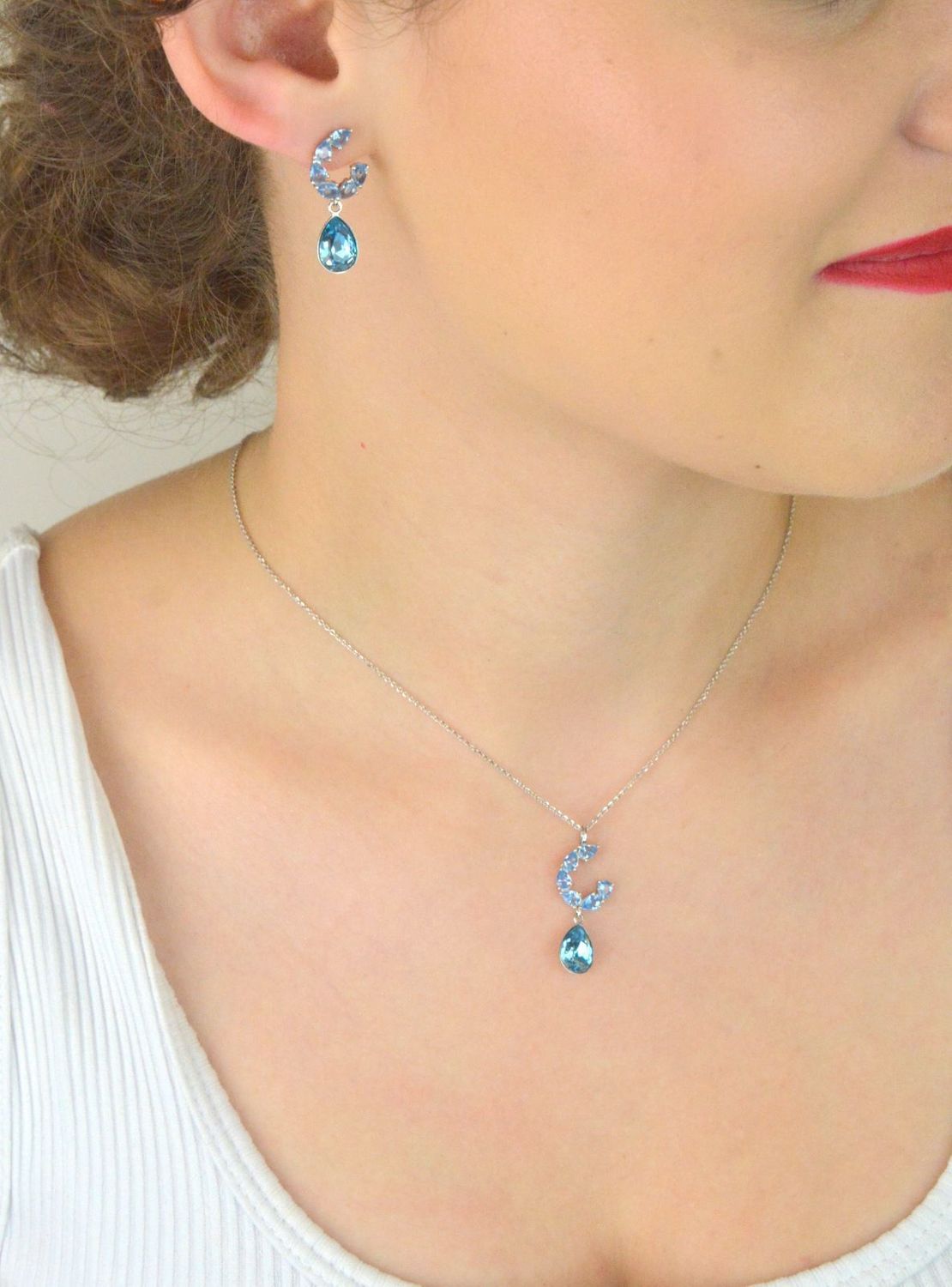 Kolczyki Spark KK4320AQAQ ze srebra 925 z austriackimi kryształami. Eleganckie, błyszczące, zapinane na sztyft. Długość 2,6 cm.1.jpg