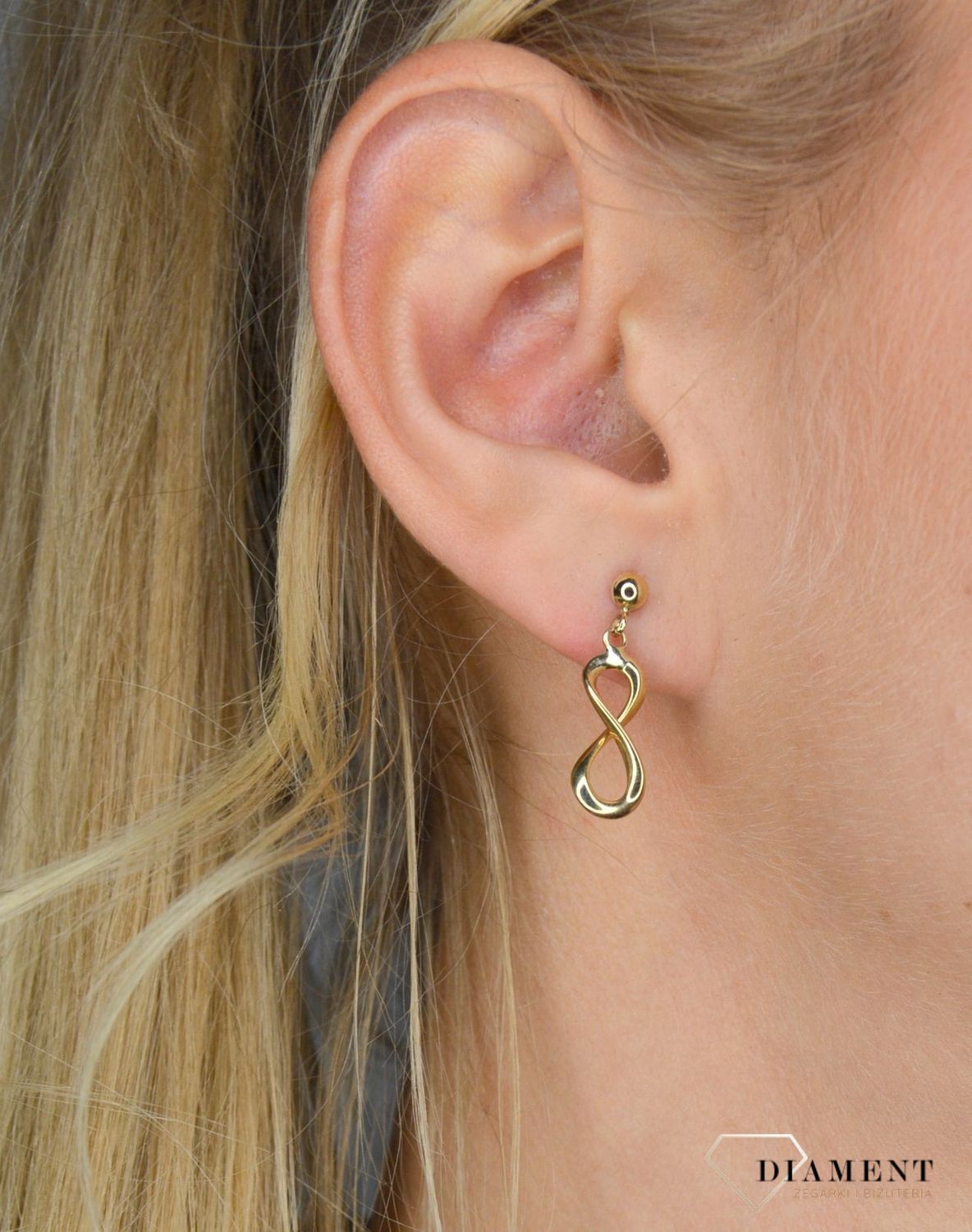 Złote kolczyki wiszący znak nieskończoności.jpg