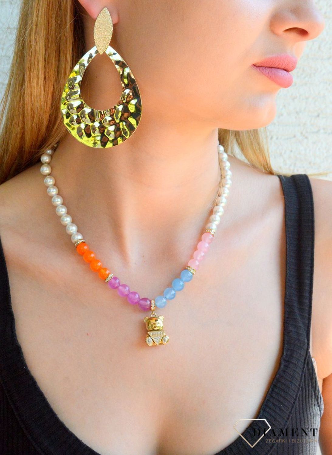 Kolczyki damskie gniecione łezki w złotym kolorze KOLTEAR000101100. Kolczyki damskie łezki. Kolczyki wiszące gniecione łezki. Kolczyki antyalergiczne na prezent. Kolczyki na sztyft idealne na prezent. Kolczyki pozłacane wiszące łezki..jpg